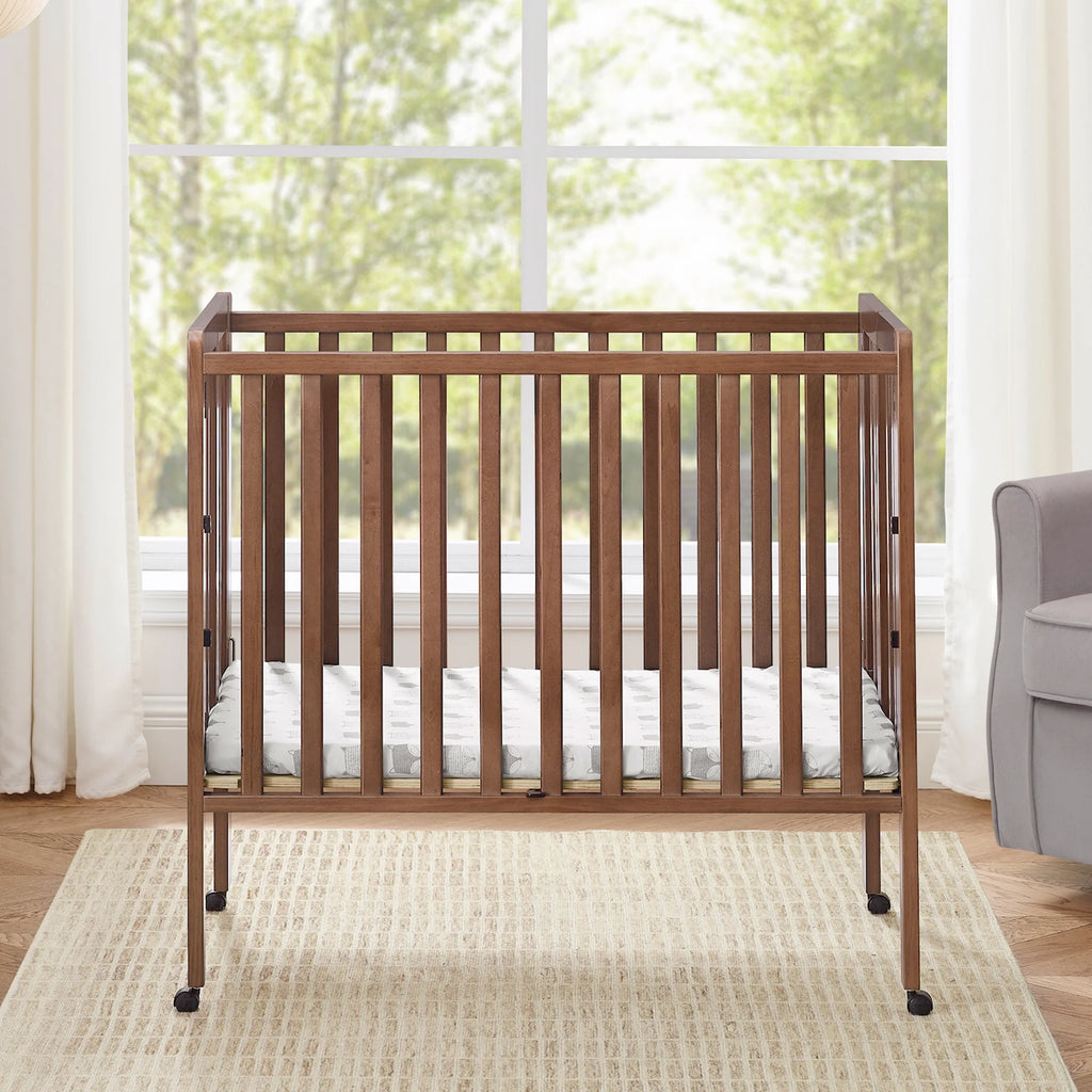 Delta Children Lee Portable Folding Mini Crib with 1.5 - Inch Mattress - Greenguard Gold Certified, Bianca White