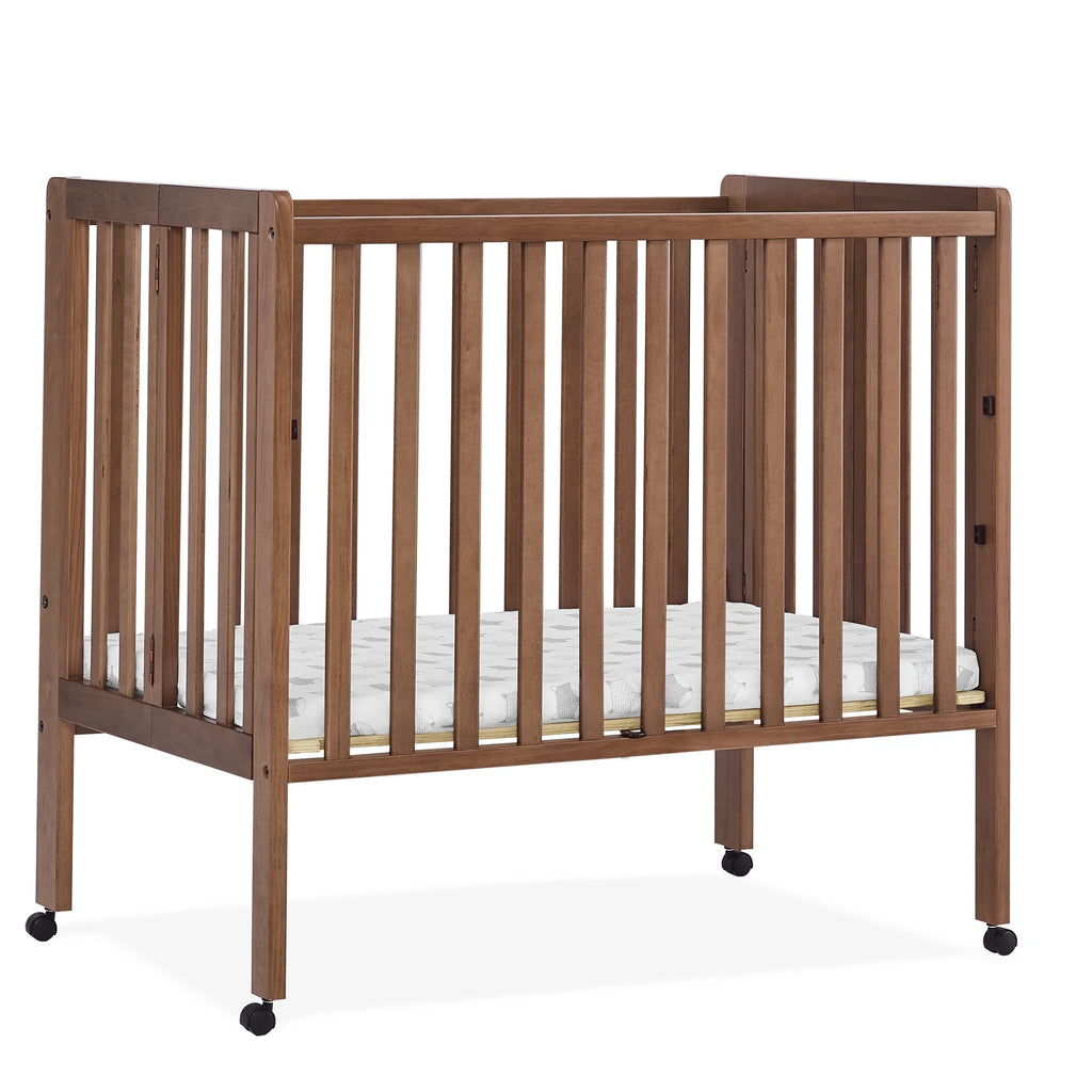 Delta Children Lee Portable Folding Mini Crib with 1.5 - Inch Mattress - Greenguard Gold Certified, Bianca White