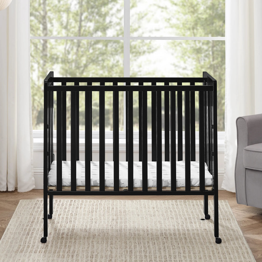 Delta Children Lee Portable Folding Mini Crib with 1.5 - Inch Mattress - Greenguard Gold Certified, Bianca White