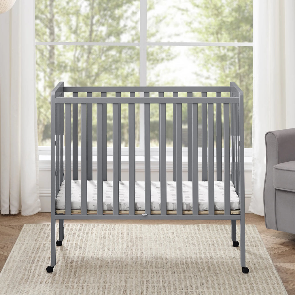 Delta Children Lee Portable Folding Mini Crib with 1.5 - Inch Mattress - Greenguard Gold Certified, Bianca White