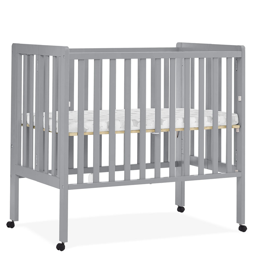 Delta Children Lee Portable Folding Mini Crib with 1.5 - Inch Mattress - Greenguard Gold Certified, Bianca White
